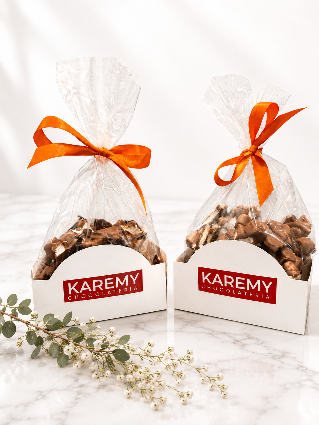 Bolsas de regalo con moño naranja